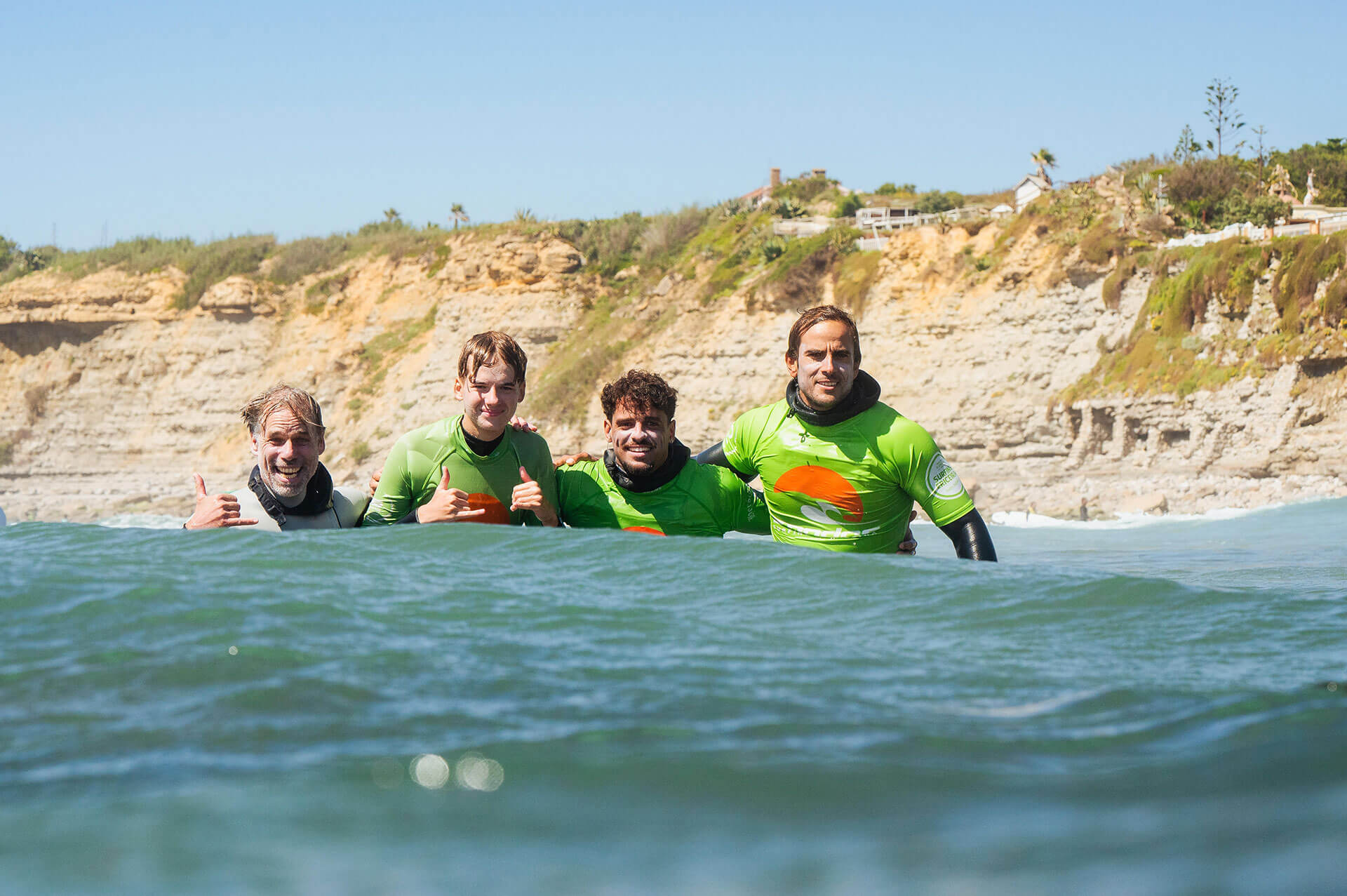 The 3 Ondas team in the water in Ericeira